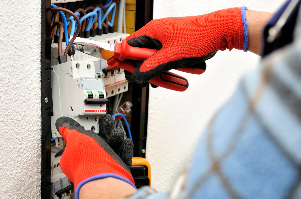 electrician working with gloves