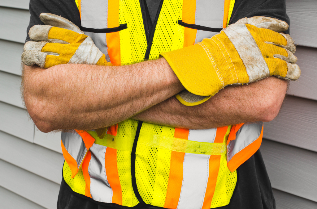 worker wearing yellow and white General Purpose Work Gloves